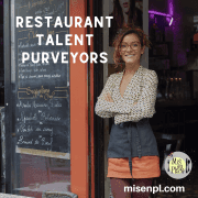 House ad: a restaurant owner standing in her doorway